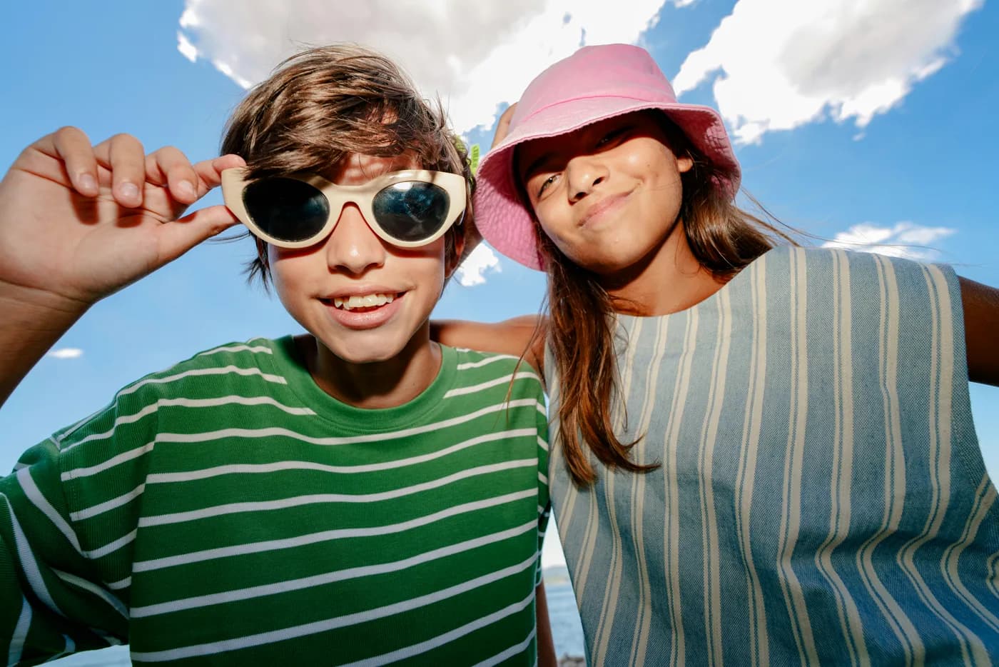 Two confident young people outdoors